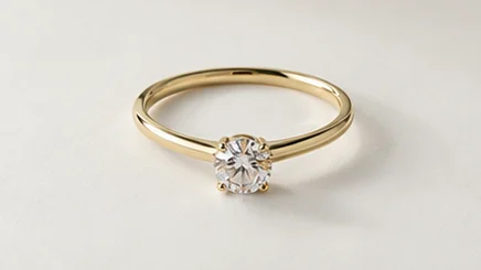 Gold solitaire ring
