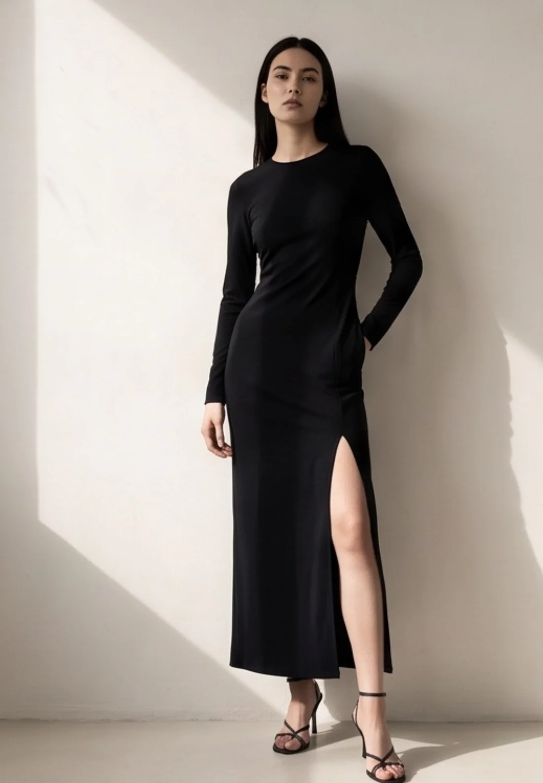 Black column dress, on the model